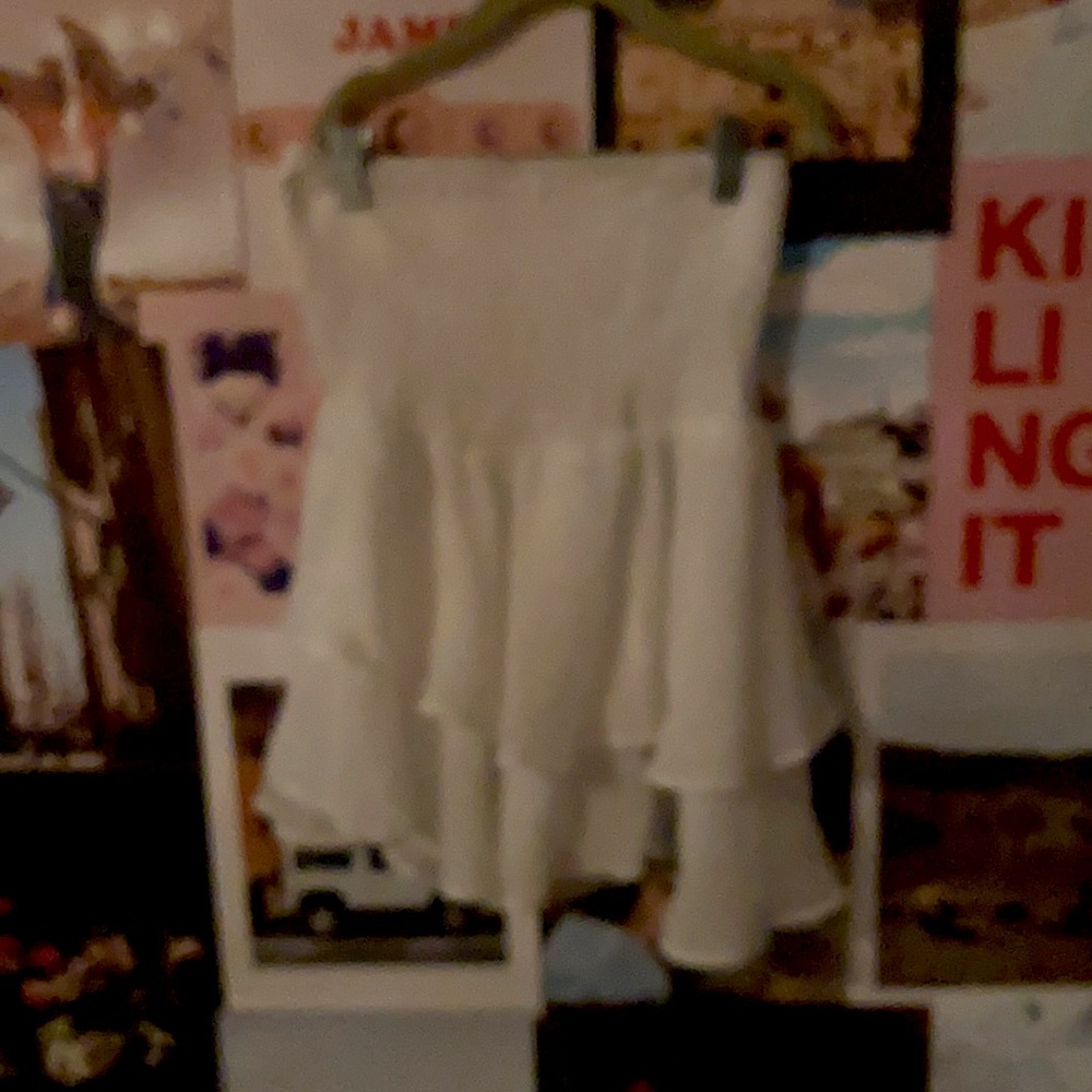 White ruffled skirt